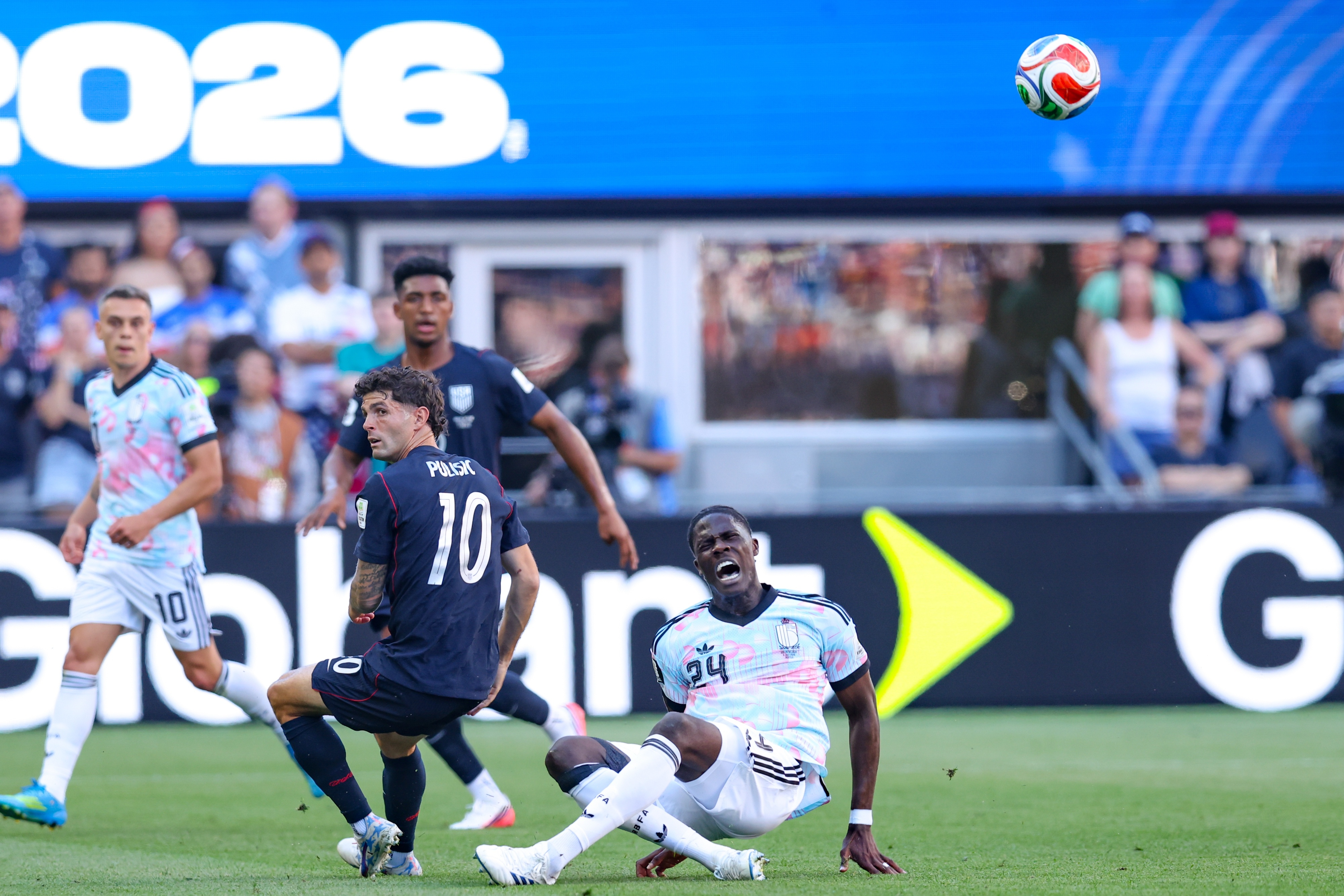 Passionate crowd cheering during a FIFA World Cup 2026 match